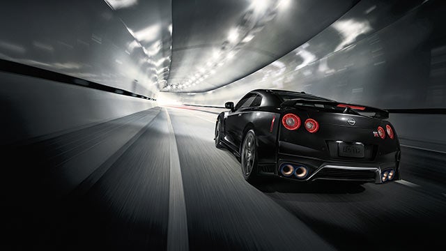 2023 Nissan GT-R seen from behind driving through a tunnel | Fort Collins Nissan in Fort Collins CO